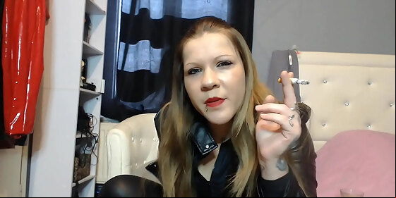 humiliation for submissive man by sexy dominatrix with a strapon